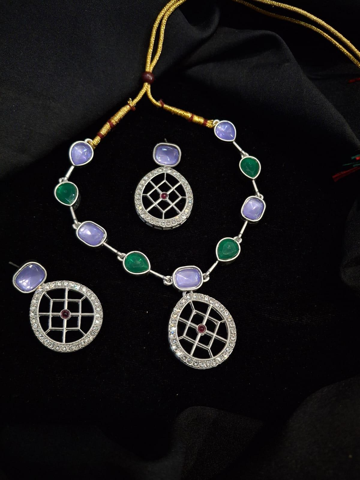 Rajwadi Style Matte Silver Plated Purple And Green Stone Studded Jewellery Set - ASMITTA Jewellery