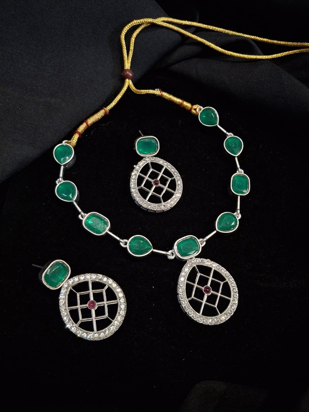 Rajwadi Style Matte Silver Plated Green Stone Studded Jewellery Set - ASMITTA Jewellery