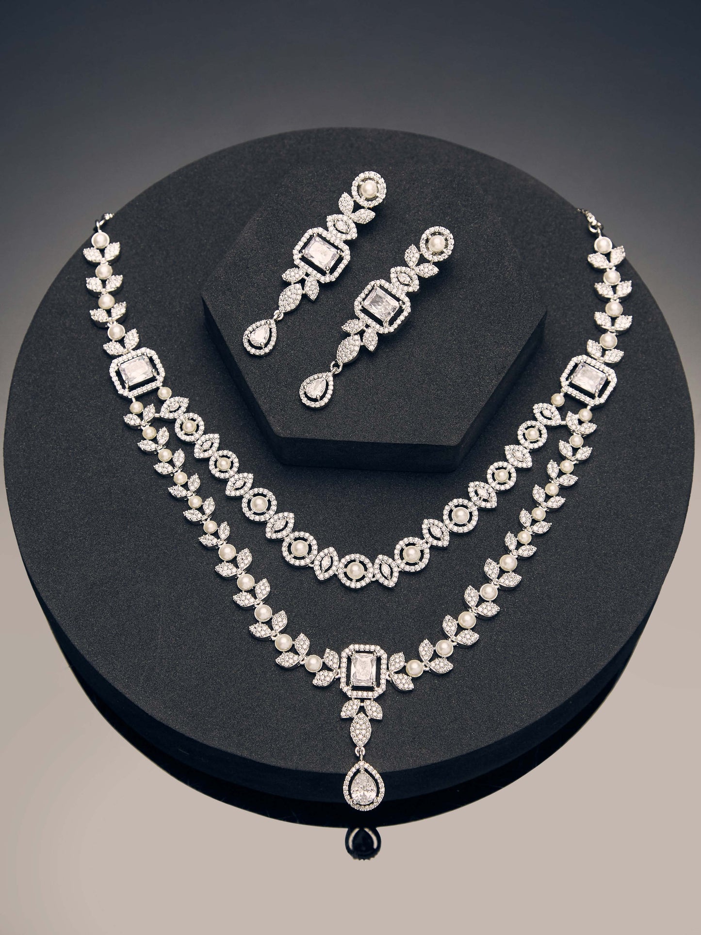 white CZ double layered diamond necklace set with rhodium finish and elegant drop earrings