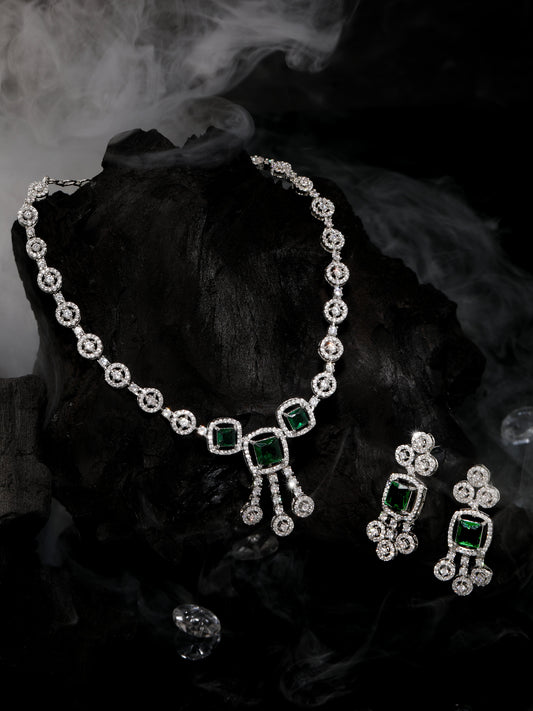 Rhodium-plated jewellery set with green and white cubic zirconia stones with matching earrings