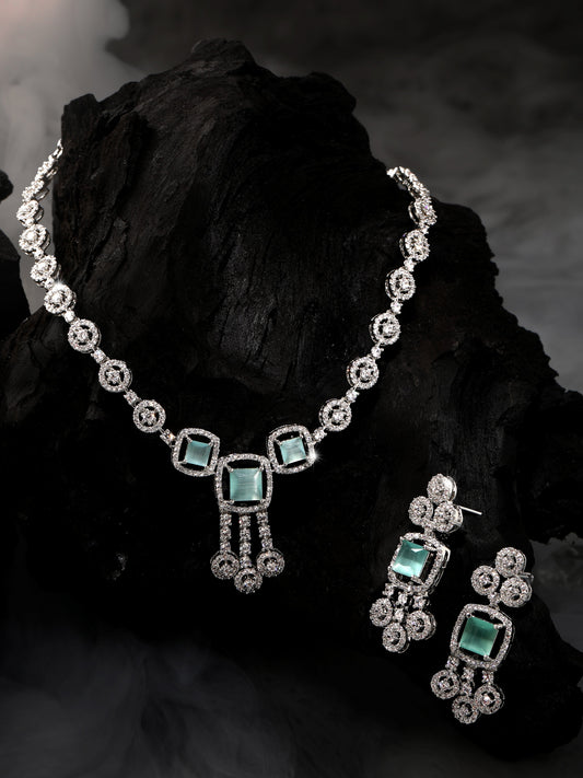 Rhodium-plated statement jewellery set with sea green square stones and white American diamonds