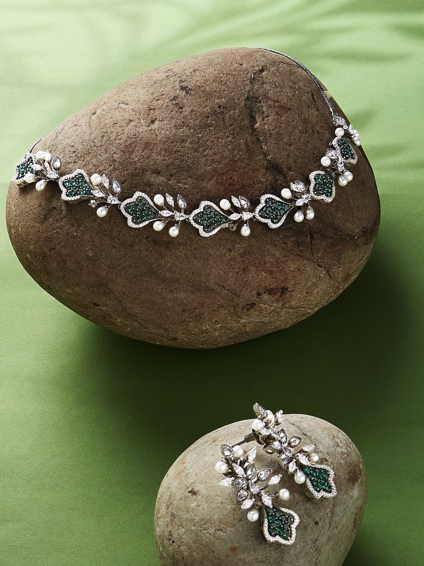 Black-plated diamond and pearl choker set with green cubic zirconia stones and drop earrings