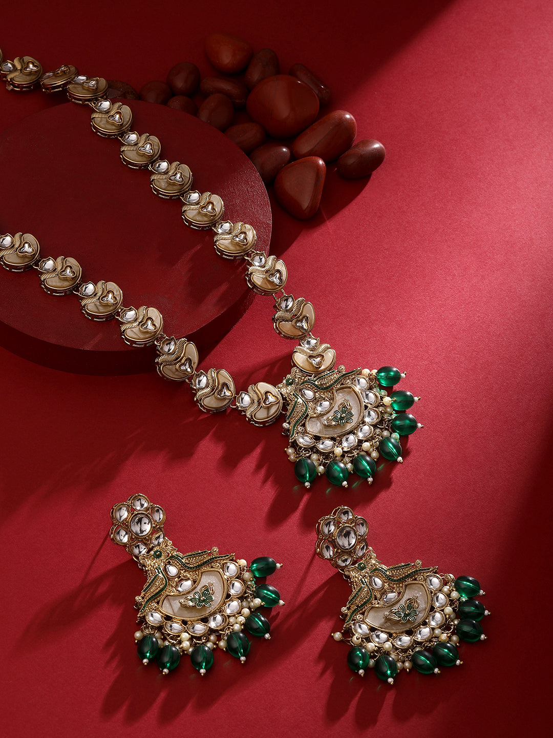 Meenakari bridal jewellery set with green stones and traditional design