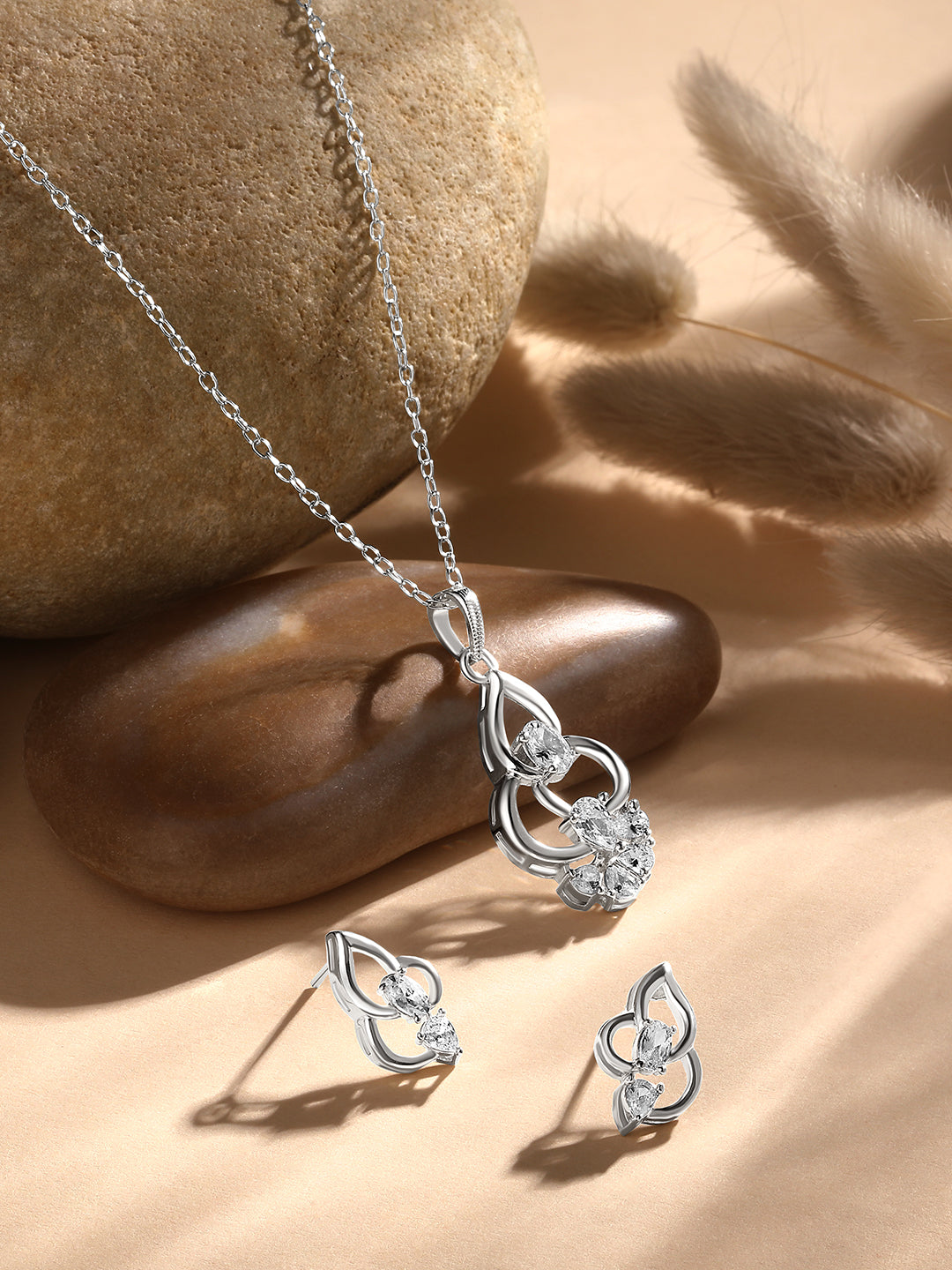 Sterling Silver With Cubic Zirconia And Silver Plating.