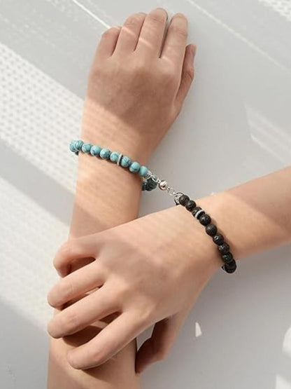 Bracelet With Black And Blue Pearl On Silver Plating.