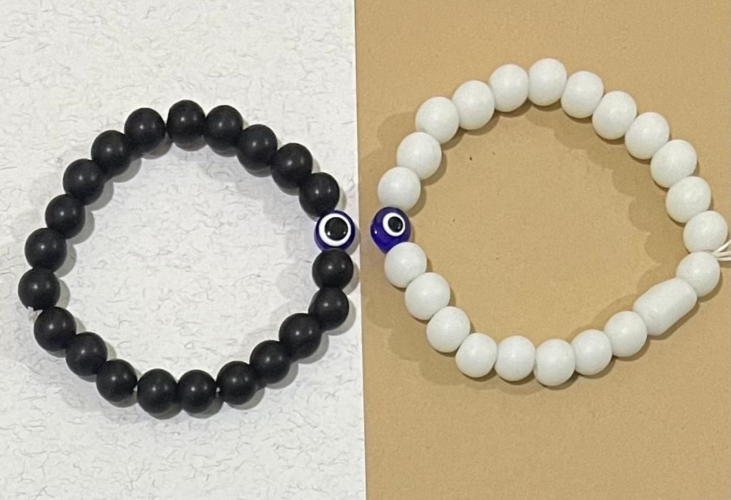 Silver Plated Bracelet With Black And White Pearls.