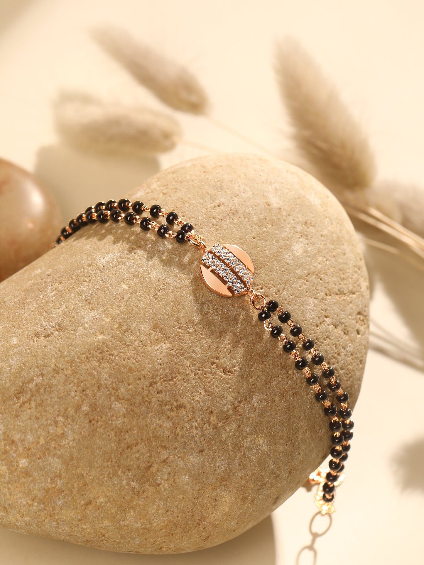 Bracelet With Rose Gold Cubic Zirconia And Gold Plating.
