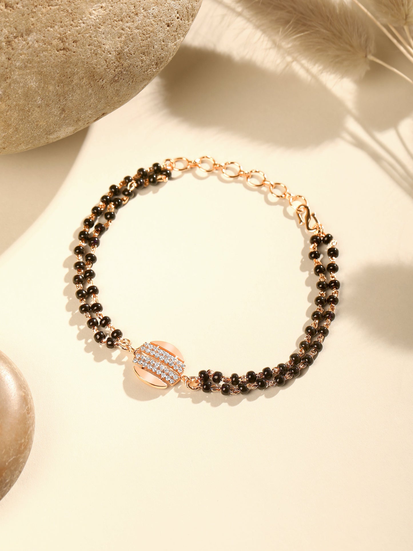 Bracelet With Rose Gold Cubic Zirconia And Gold Plating.