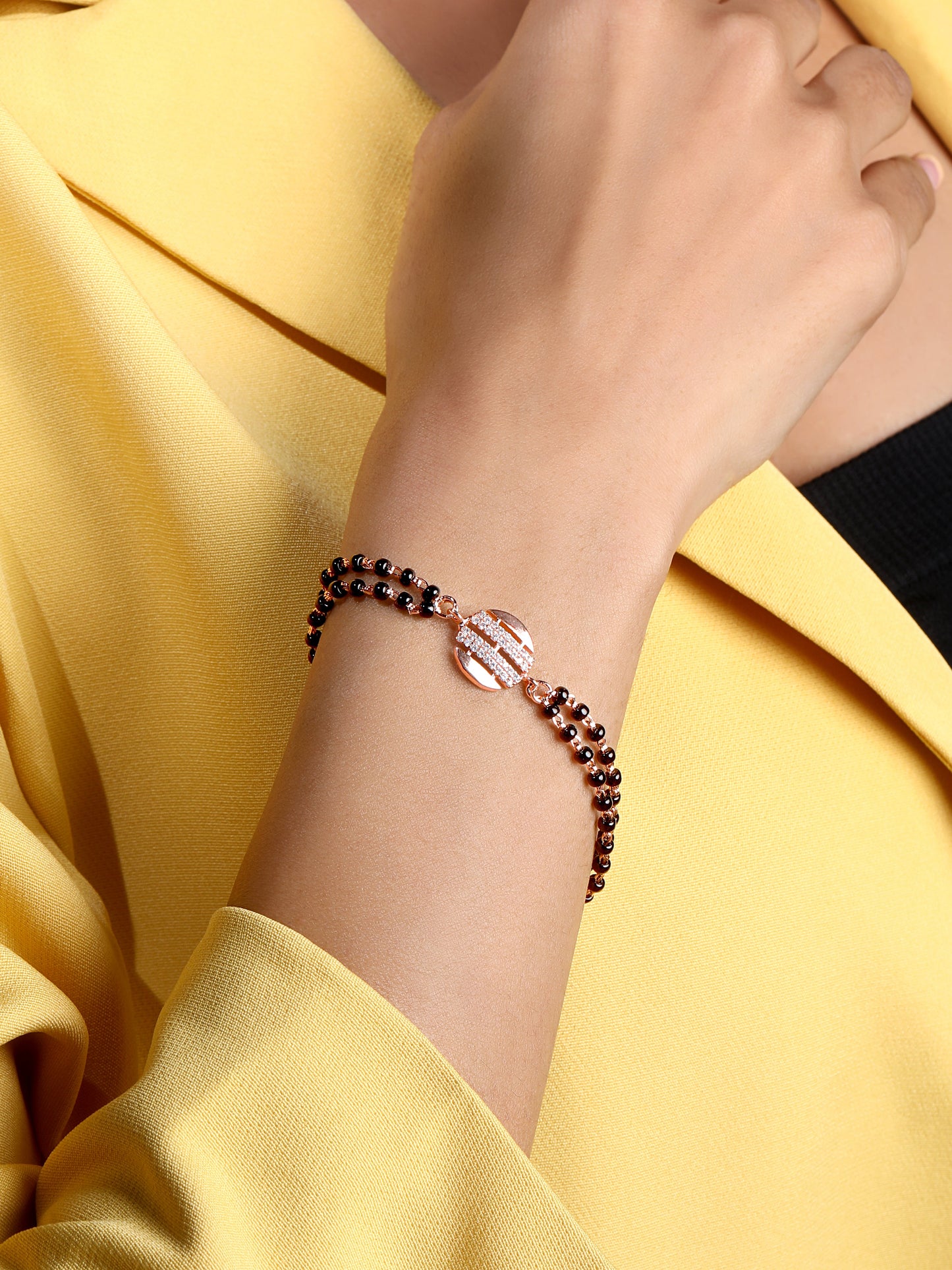 Bracelet With Rose Gold Cubic Zirconia And Gold Plating.