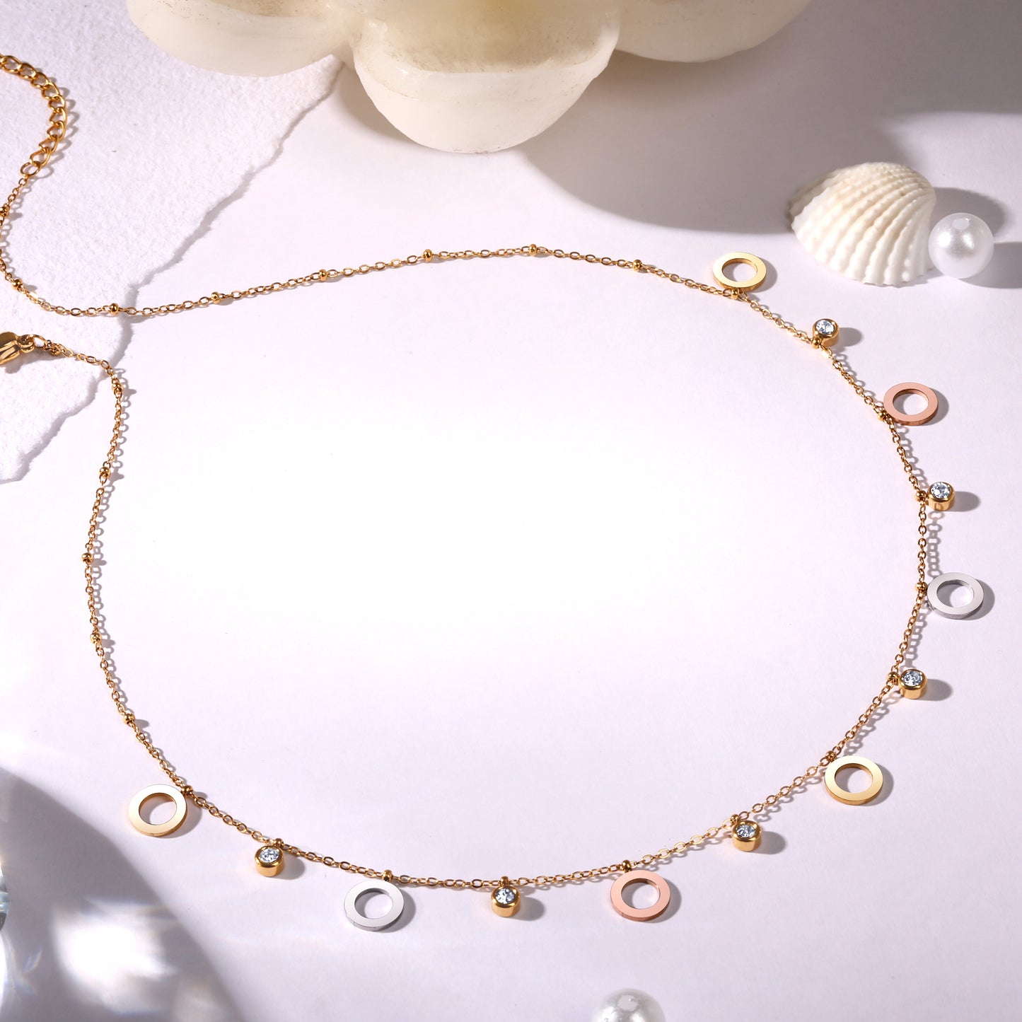 Gold Plated Brass Chain With American Diamond And Lobster Claw Clasp.