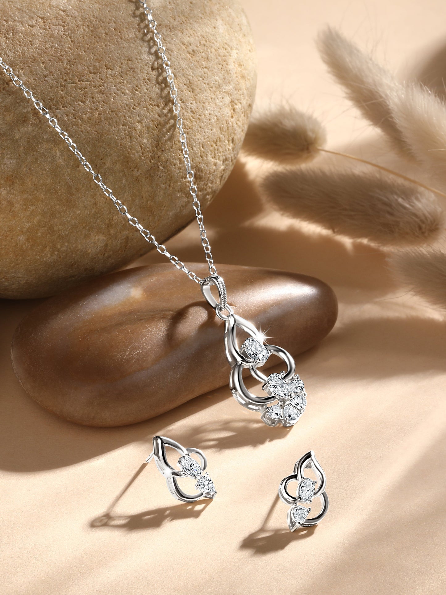 Sterling Silver With Cubic Zirconia And Silver Plating.