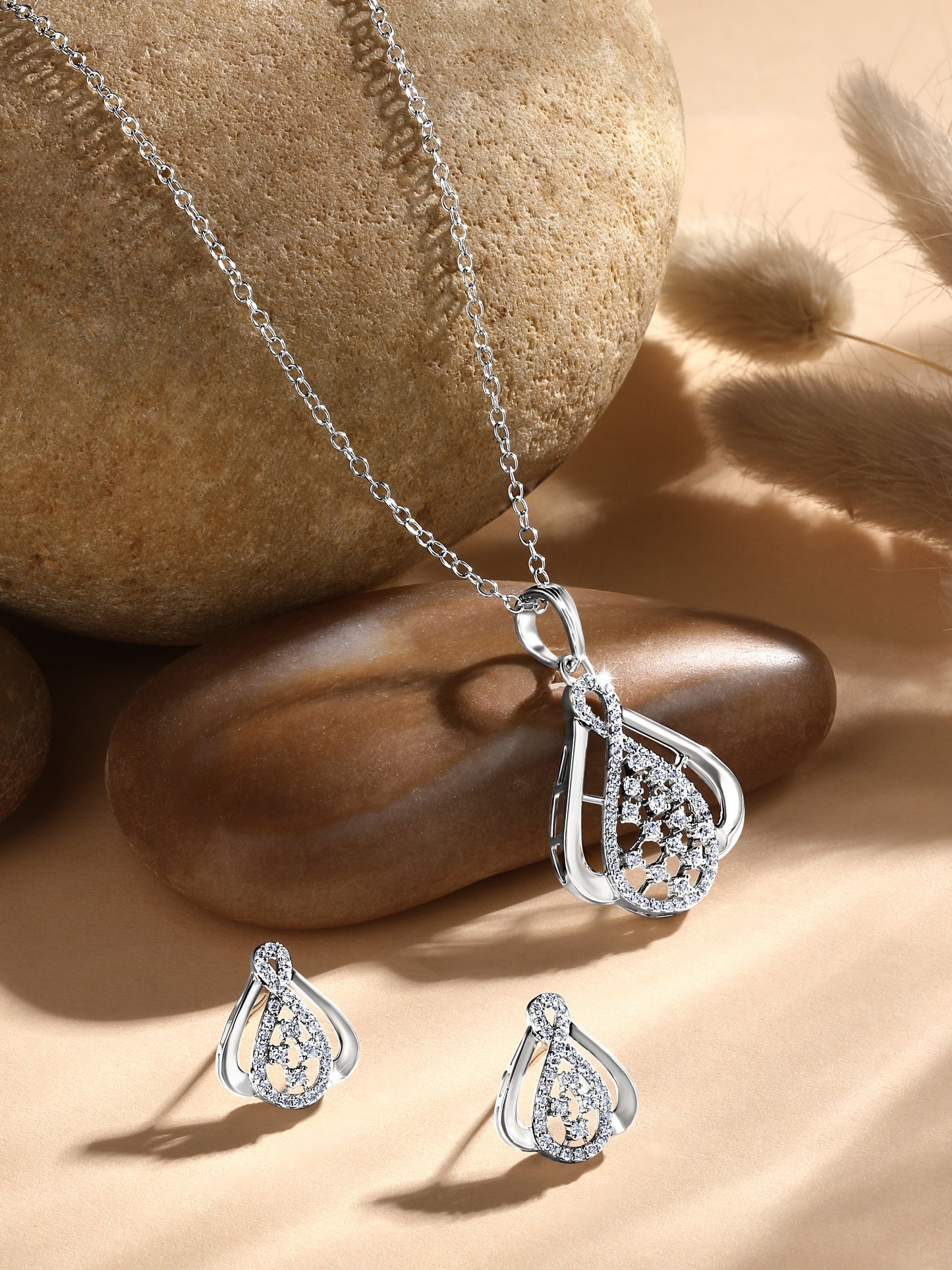 Sterling Silver With Cubic Zirconia And Silver Plating.