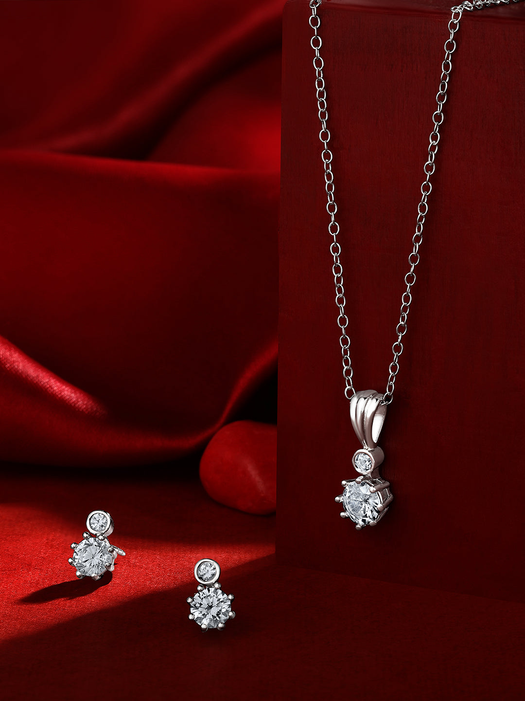 Sterling Silver With Cubic Zirconia And Silver Plating.