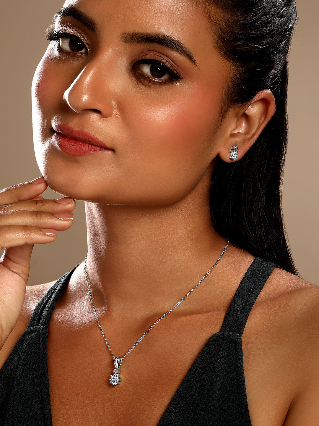 Sterling Silver With Cubic Zirconia And Silver Plating.