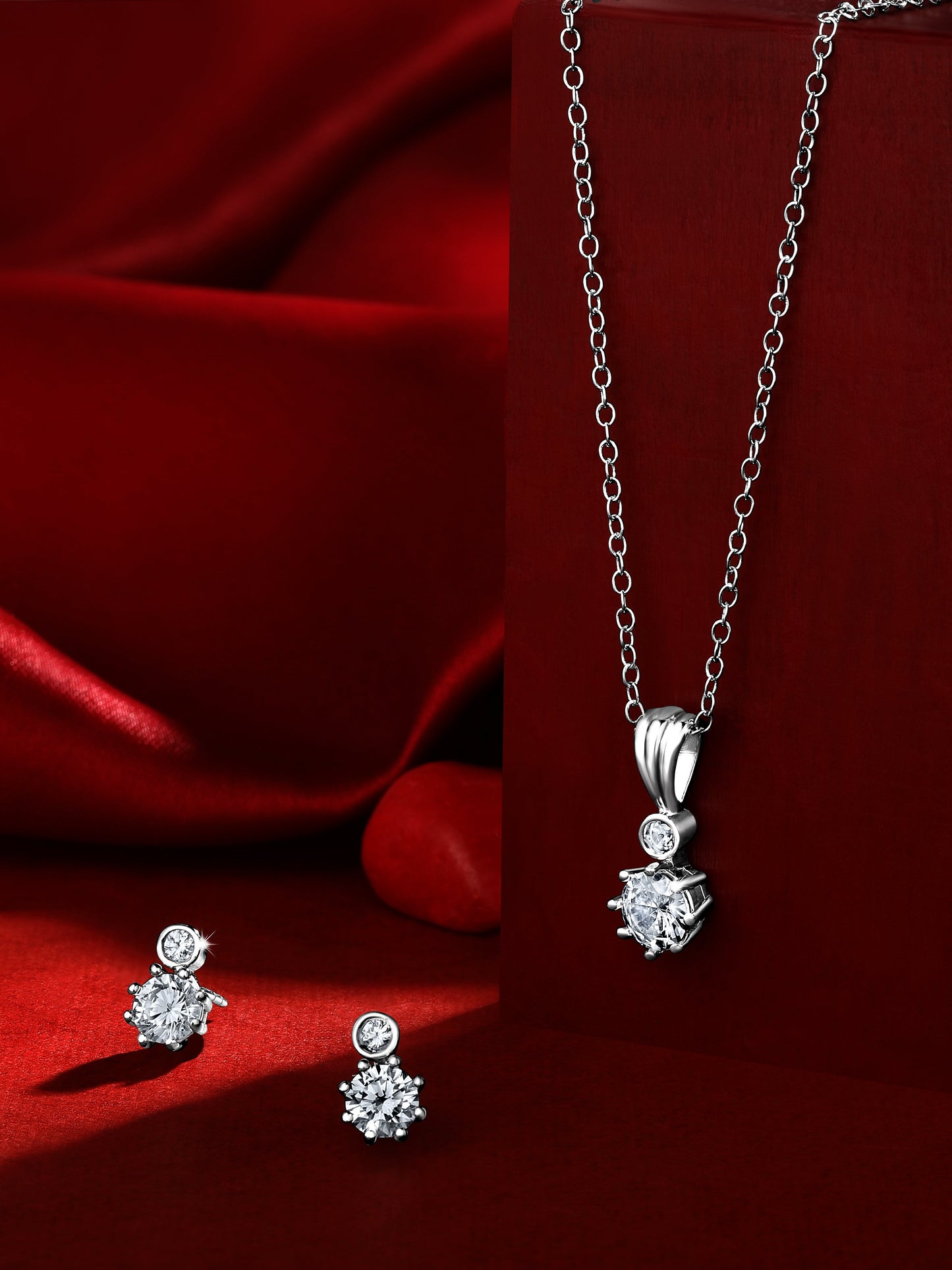 Sterling Silver With Cubic Zirconia And Silver Plating.