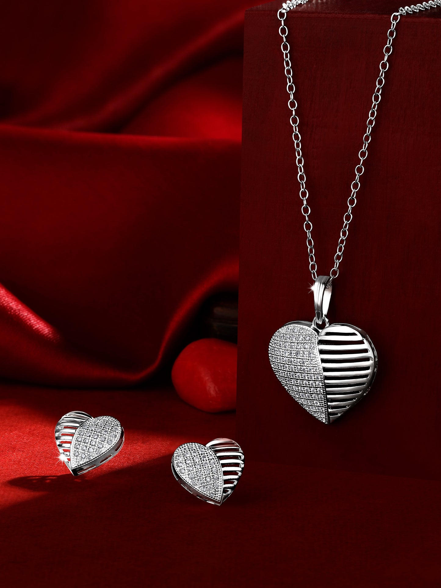 Sterling Silver With Cubic Zirconia And Silver Plating.