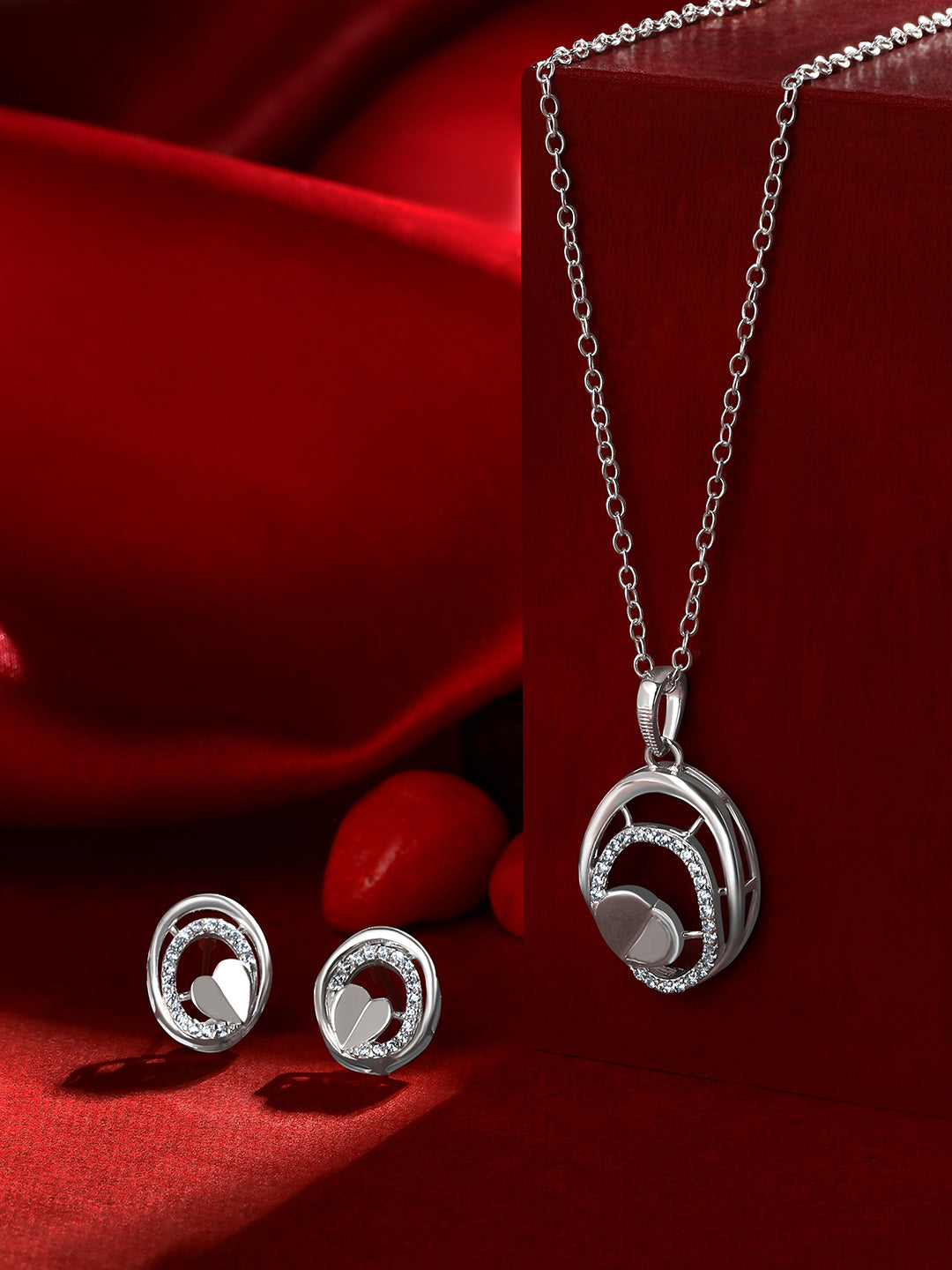 Sterling Silver With Cubic Zirconia And Silver Plating.