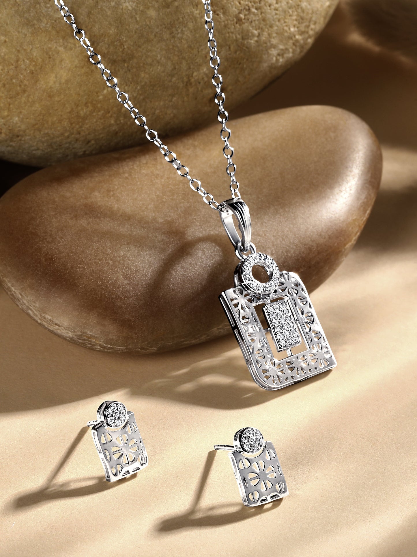 Sterling Silver With Cubic Zirconia And Silver Plating.