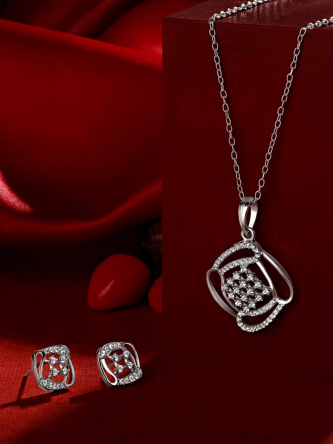 Sterling Silver With Cubic Zirconia And Silver Plating.